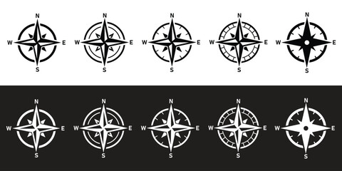 Set of diverse compass rose and navigational symbols vector illustrations. Black and white line art icons for direction, travel, exploration, and maritime design