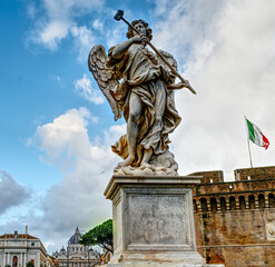 The angle with the sponge located the the Ponte Sant' Angelo bridge with the Italian flag and Saint Peter's basilica in the background.