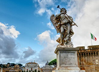 The angle with the sponge located the the Ponte Sant' Angelo bridge with the Italian flag and Saint Peter's basilica in the background.