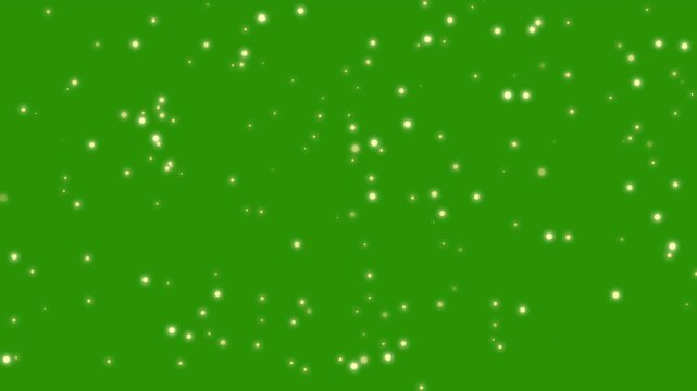 Glowing glitter particle falling on green screen background. Sparkling dust light overlay. Golden shimmering around confetti dust particles. Glitter sparkle animated overlay footage. 4K Loop