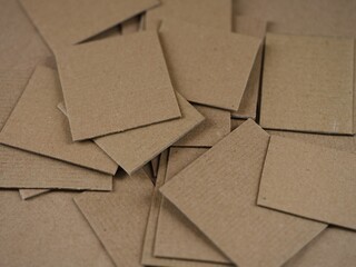 Heap of brown cardboard pieces.