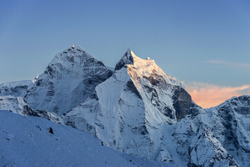 Kangtega and Thamserku peaks at sunset. View from Lobuche on Everest base camp trekking, Nepal.