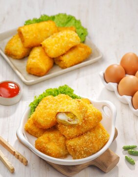 Risoles Mayo or Risol mayonnaise is a traditional roll-shaped snack that has various fillings, from ragout, eggs, to smoked beef.