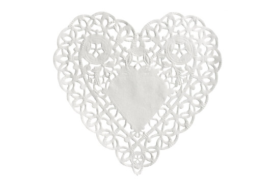 Lacy paper table mat in the shape of a heart isolated on white or transparent background, valentine's day love doily png cut out