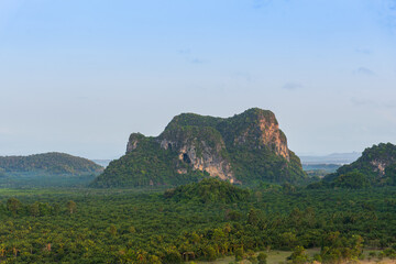 Scenic Mountain Landscape with Lush Green Vegetation Under Clear Sky, Thailand