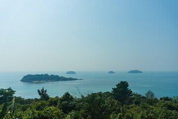 Serene Coastal Landscape with Islands and Clear Blue Skies