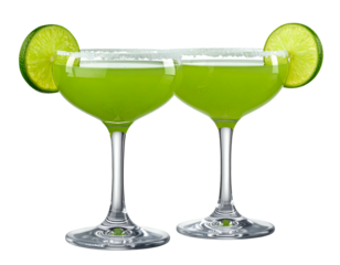 Two vibrant green cocktails rimmed with salt and lime