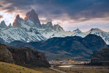 Small village El Chalten beneath the dramatic skyline of Mount Fitz Roy and Cerro Torre in Argentina's Patagonia