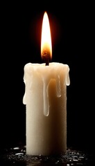 A lit candle with molten wax dripping down its side, set against a dark background, evokes a sense of serenity and solemn reflection.