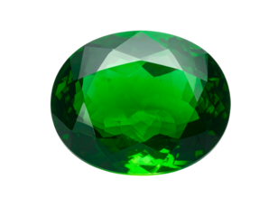 A faceted, oval, vibrant green gemstone against black