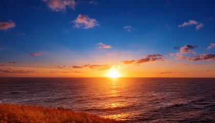 Obraz premium A Majestic Sun Rises Above The Horizon