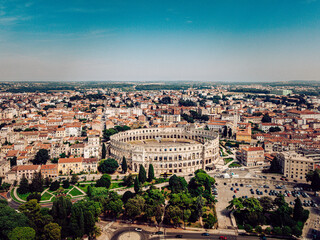 Aerial view of the magnificent Pula Arena, standing as a testament to ancient Roman architecture amidst the urban landscape, Pula, Istria County, Croatia.