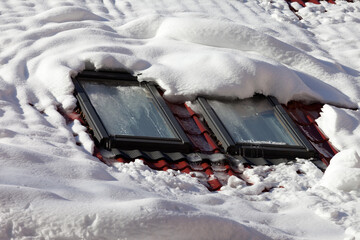 Snowy roof with windows