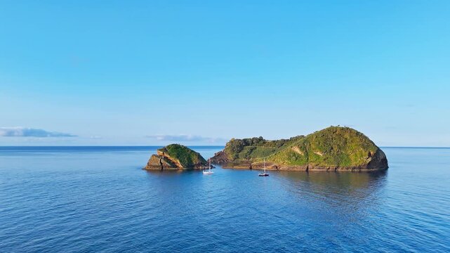Rocky crater island with crater lake in front of the Sao Miguel island, Azores, Portugal, Ilheu de Vila Franca do Campo
