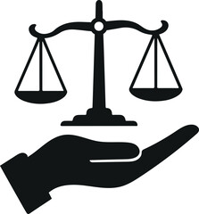 Hand holding scales of justice