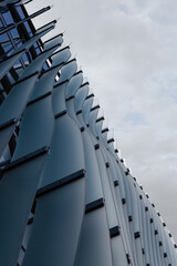 Waves on the glass facade of a building