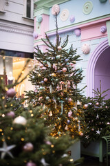 Christmas trees decorated with Christmas balls on the city streets
