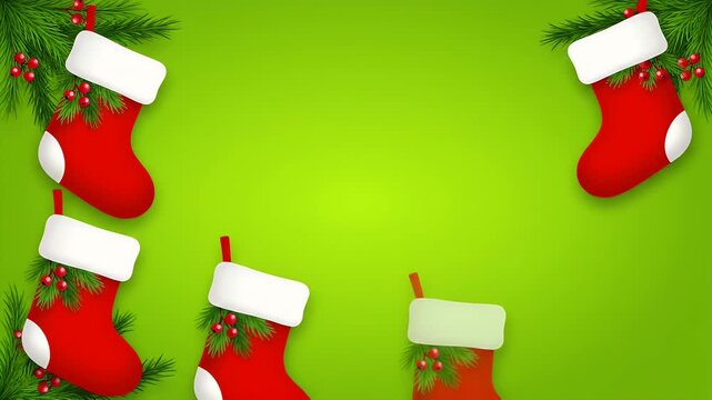 Festive red Christmas stockings hanging on green background