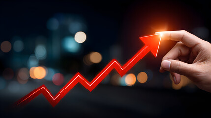 Hand pointing downward on a red decreasing graph