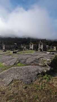 Traditional Granaries of Lindoso, Portugal on a Foggy Day