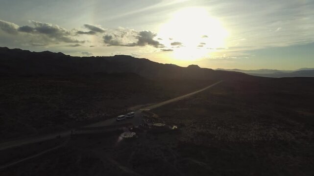Aerial view of a drone flying forward on the Chivay road towards the Colca Valley during sunrise.