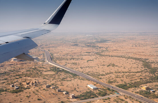 Flying over Rajasthan, India. Dry land in the desert, aerial view.	

