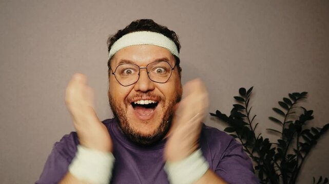 Funny fat man doing fitness.