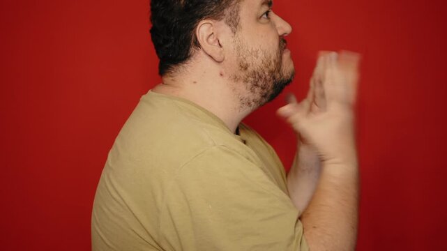 An angry man swears and shouts