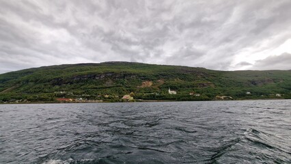 Langvatnet is a large freshwater lake in Norway, located in a remote mountainous landscape that also forms part of a former and active mining area. The surroundings combine natural beauty with industr