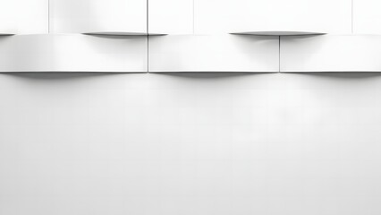 A minimalist architectural detail showcasing a series of modern white recessed ceiling lights illuminating a blank wall