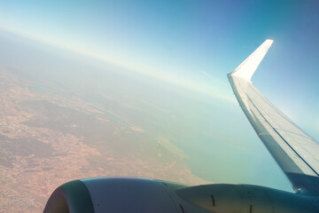 Jet Engine and Wing of an Aircraft in Flight