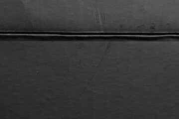 Abstract old concrete wall with black background, scratched surface and vintage frame look for dramatic, grunge visual projects.