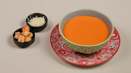Tomato soup bowl isolated