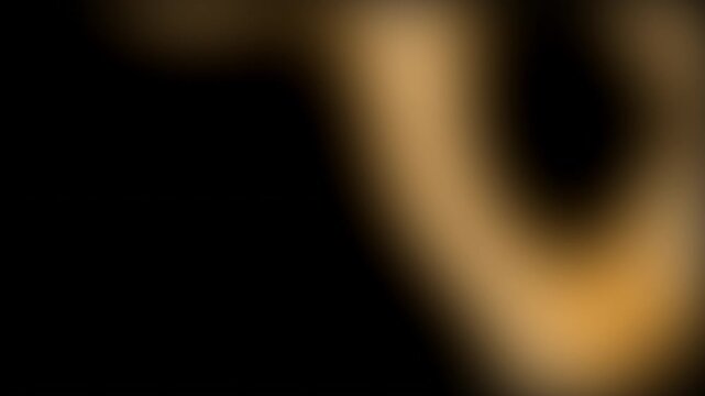 Vibrant lights. Gold  gradient flow on black background. Dynamic motion. Neon glow bright color. Loop animation 