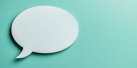Blank speech bubble on teal background for communication design  
