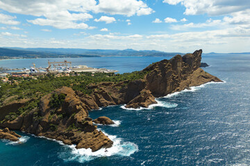 Obraz premium Rocky red coastline La Ciotat with Calanque of Figuerolles, Aerial drone shot. Provence, South France