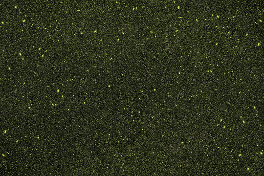 Rich seamless texture of fine green glitter sparkling softly, like enchanted forest moss lit by tiny fairy lights, creating a magical, luxurious background for festive natural designs

