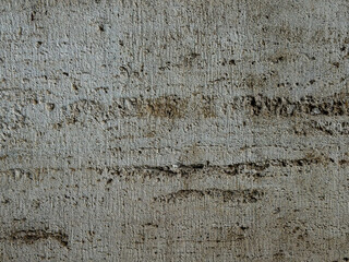 Gray rough concrete wall texture abstract background © Enigma