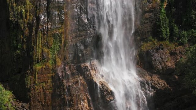 Aerial view of Diyaluma Waterfall Flowing Down a Steep Rock Face, Sri Lanka