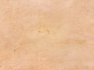Obraz premium Beige rough plaster wall surface background texture