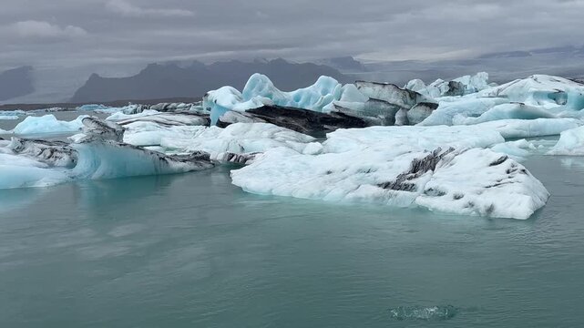 Arctic Fjord with Floating Icebergs in Greenland