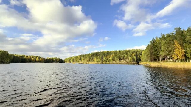 View of the shores of Finland's largest lake Saimaa, late afternoon