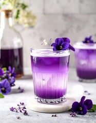 Purple layered drink with flowers