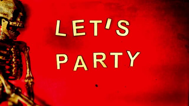 Skeleton and the words let's party on red, animated with stop motion.