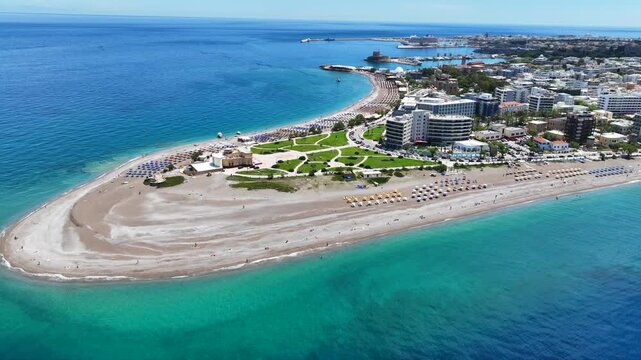 Aerial drone cinematic video of Rodos  or Rhodes island town Elli beach and peninsula a popular summer tourist destination, Dodecanese, Aegean, Greece