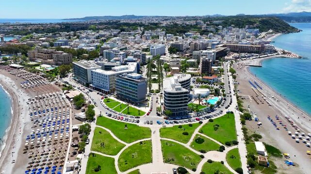 Aerial drone cinematic video of Rodos  or Rhodes island town Elli beach and peninsula a popular summer tourist destination, Dodecanese, Aegean, Greece