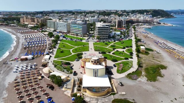 Aerial drone cinematic video of Rodos  or Rhodes island town Elli beach and peninsula a popular summer tourist destination, Dodecanese, Aegean, Greece