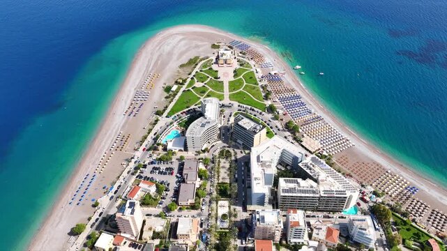 Aerial drone cinematic video of Rodos  or Rhodes island town Elli beach and peninsula a popular summer tourist destination, Dodecanese, Aegean, Greece
