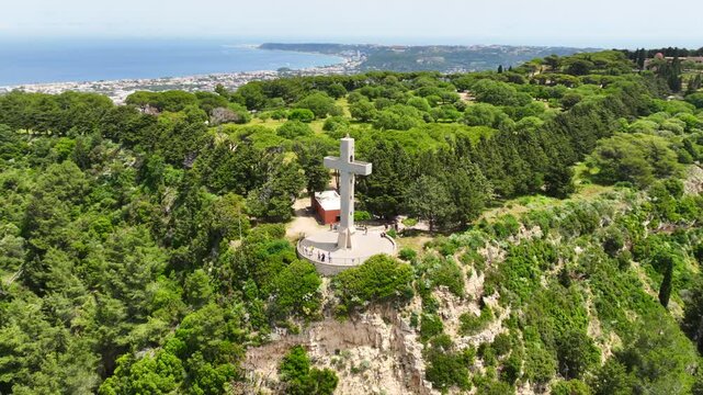 Aerial drone cinematic video of iconic Monastery of Filerimos, built uphill in ruins of ancient village of Ialysos, Rhodes island, Dodecanese, Greece