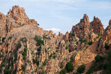 Landscape photo featuring red rocks of Calanques de Piana, Corsica
